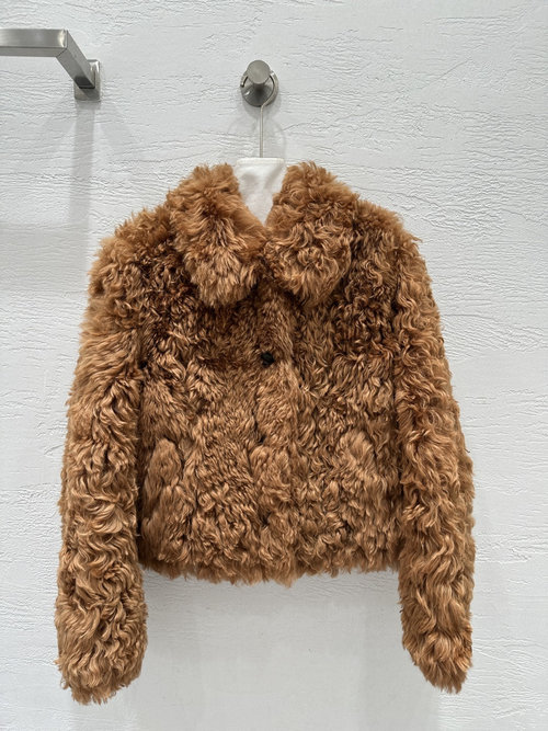 Yves Saint Laurent Imported Tuscan Fur Coat with Elegant Lapel and H-Shape Design