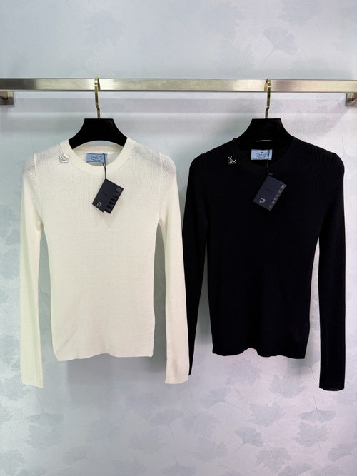 Prada Round Neck Knit Top Adorned with Metal Emblem, Exuding Elegance and Comfort