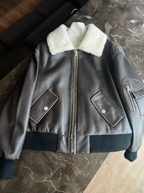 Yves Saint Laurent Elegant Genuine Leather Jacket with Customizable Options and Timeless Appeal