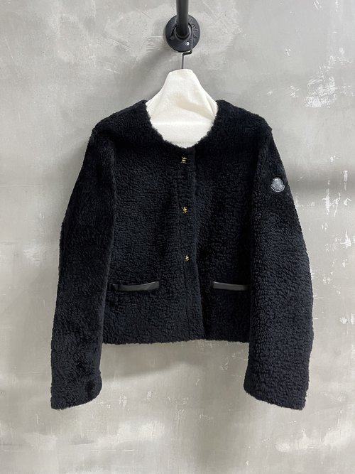 Moncler Luxurious Down Jacket with 90% White Goose Down and Fine Merino Accents