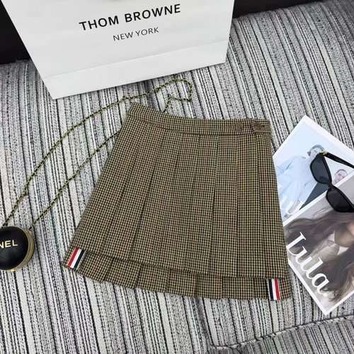 Thom Browne Classic Tweed Blazer and Pleated Skirt Ensemble with Bowknot Sleeves