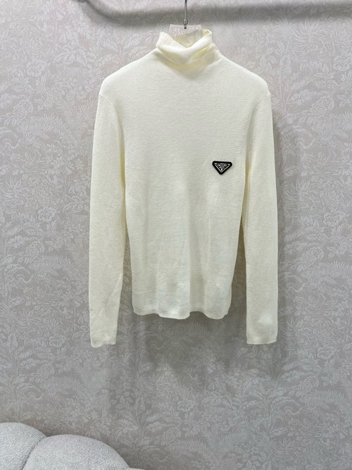 Prada Wool Turtleneck Top with Metal Logo, Elegant and Slim-Fitting