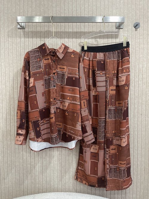 Louis Vuitton Monogrammed Silk Shirt and Tailored Straight Pants Ensemble